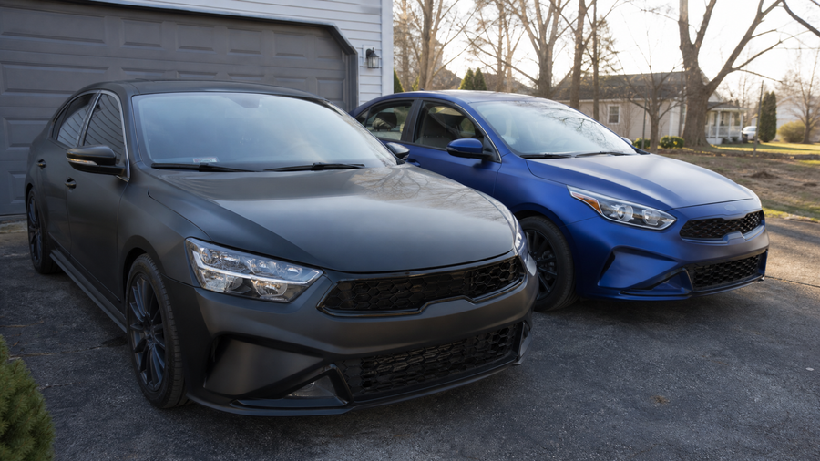 Matte and satin wrapped daily driver cars in natural daylight