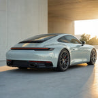 Luxury car wrapped in Brooklyn Grey gloss colored PPF at golden hour | Veloro