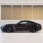 Brocade Red gloss colored PPF wrapped on a Mercedes-AMG GT side profile | Veloro