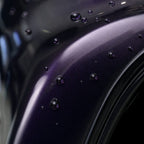Close-up of Amethyst Purple gloss TPU colored PPF surface with hydrophobic water beads | Veloro