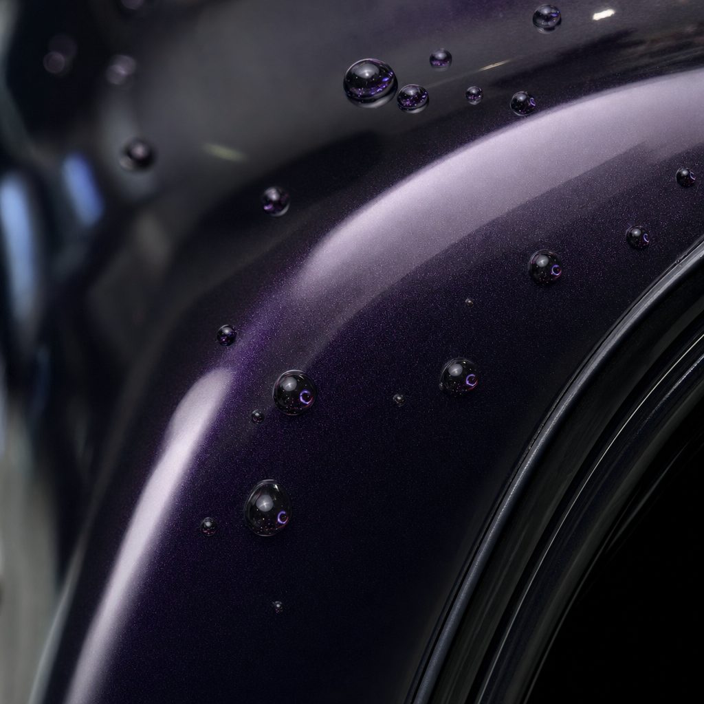 Close-up of Amethyst Purple gloss TPU colored PPF surface with hydrophobic water beads | Veloro