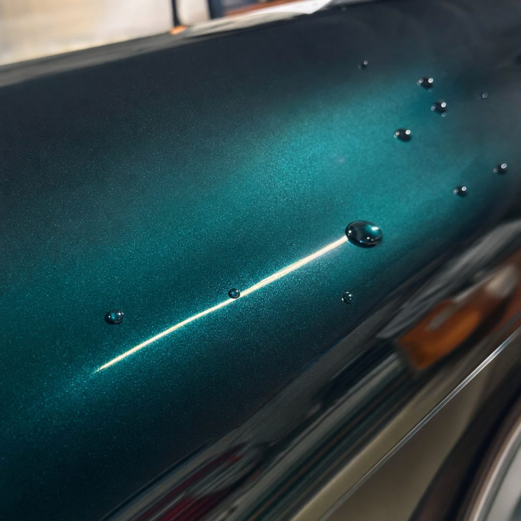 Close-up of British Green gloss colored PPF surface texture | Veloro