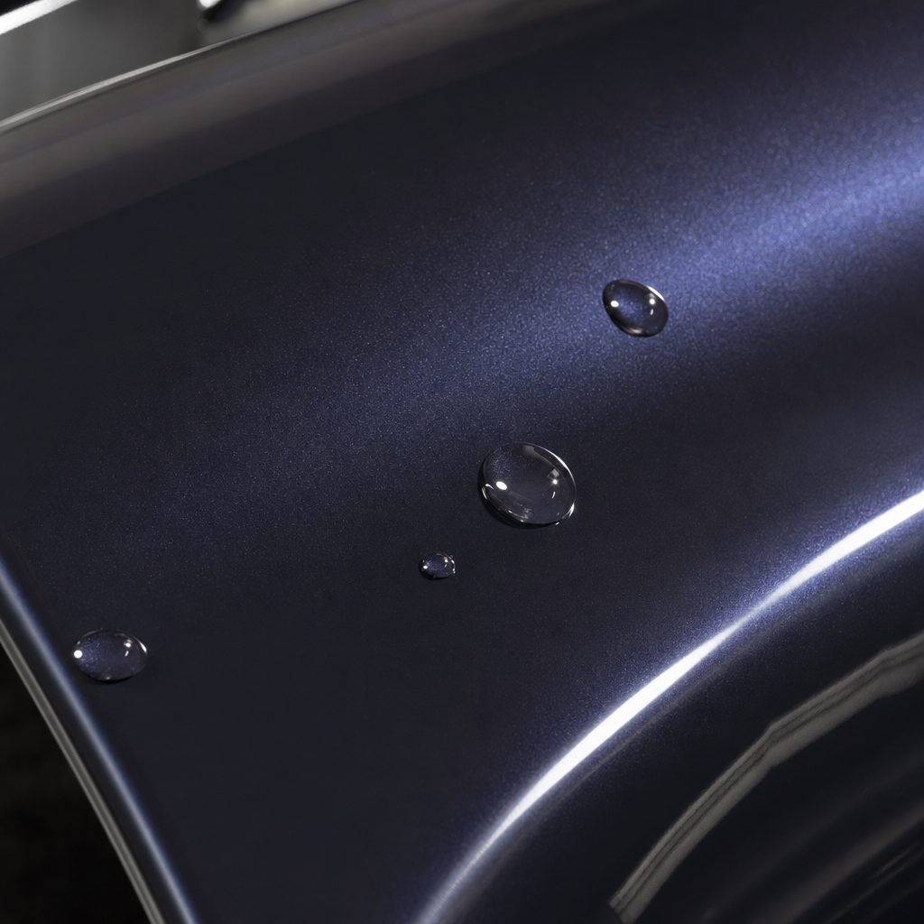 Close-up of Charcoal Blue gloss colored PPF surface texture | Veloro