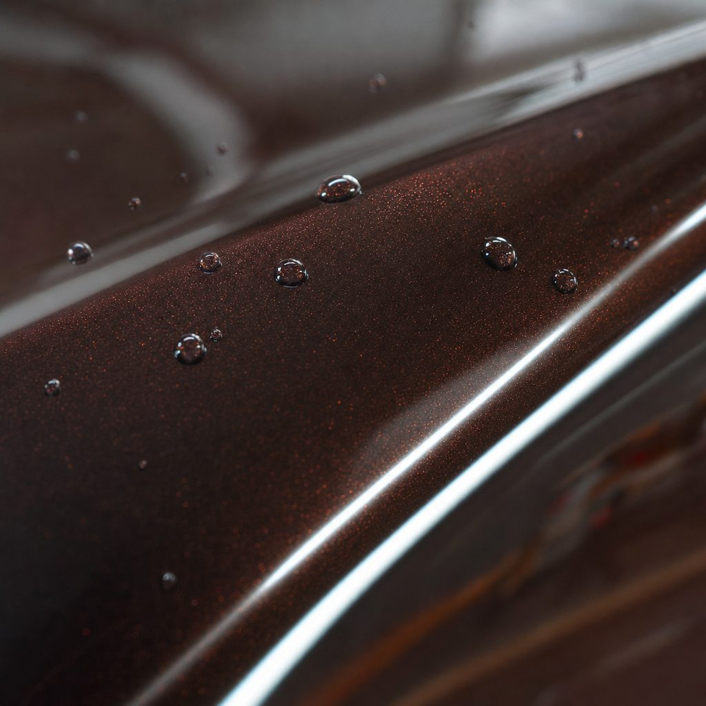 Close-up of Brocade Red gloss colored PPF surface texture | Veloro