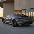 Luxury car wrapped in Bright Dark Gray gloss colored PPF at golden hour | Veloro