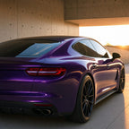 Luxury car wrapped in Bright Black Purple gloss colored PPF at golden hour | Veloro