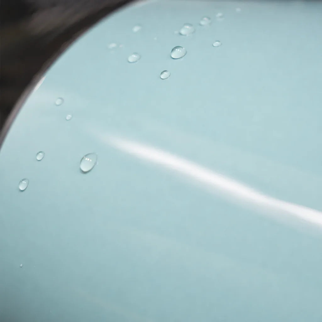 Close-up of Light Blue gloss colored PPF surface texture | Veloro