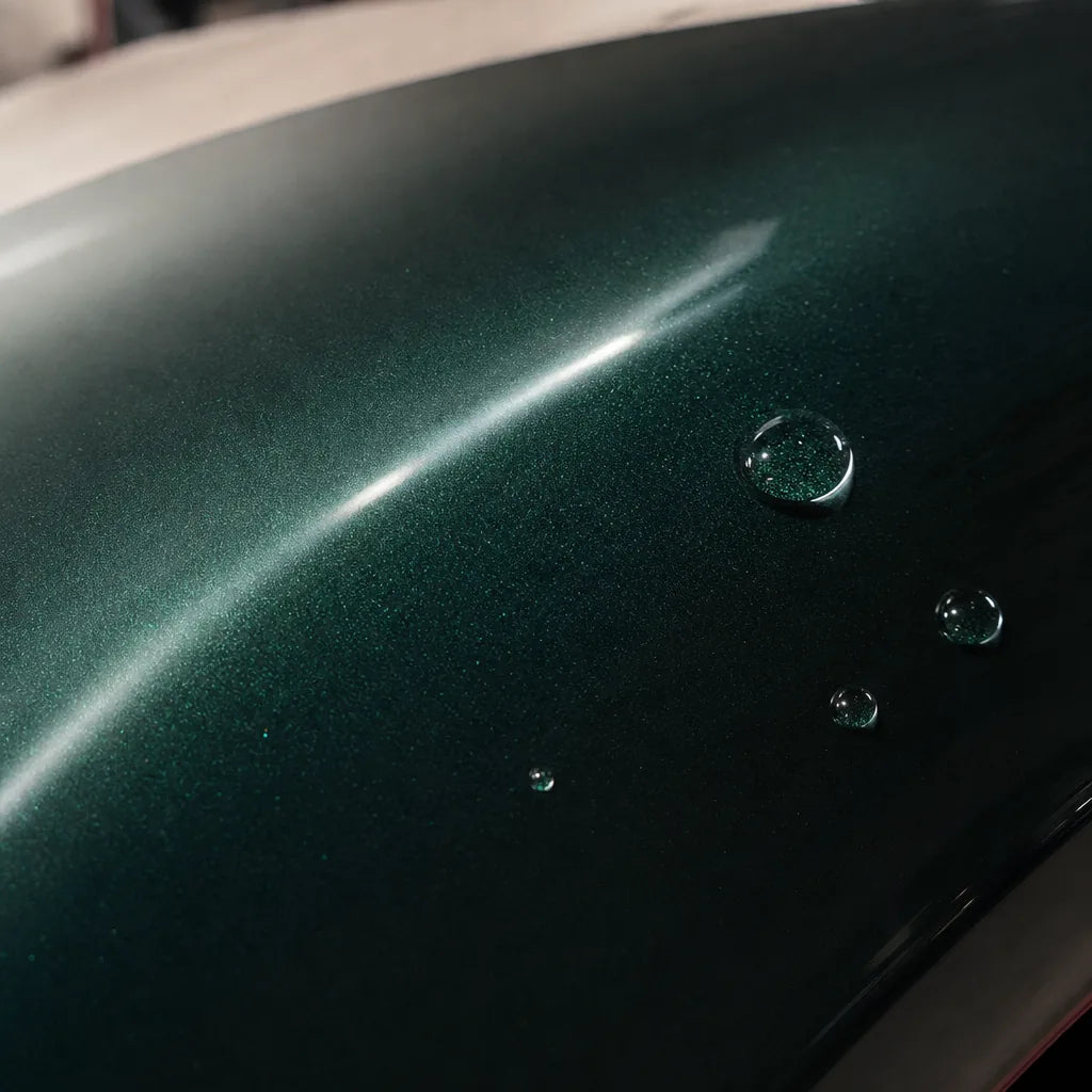 Close-up of Metallic British Royal Green gloss colored PPF surface texture | Veloro