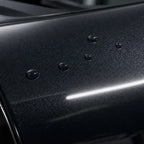Close-up of Metallic Sparkle Glitter Black gloss colored PPF surface texture | Veloro