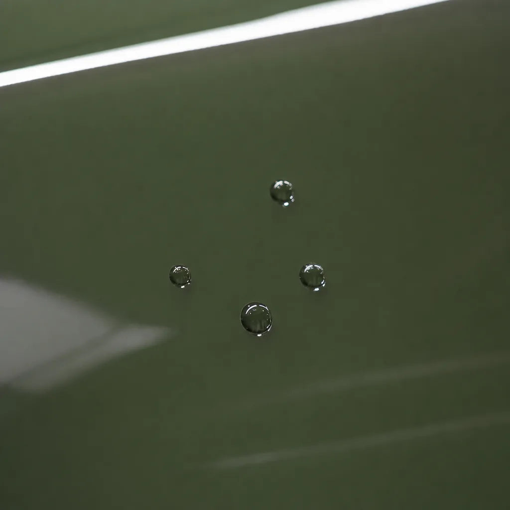 Close-up of Crystal Army Green gloss colored PPF surface texture | Veloro