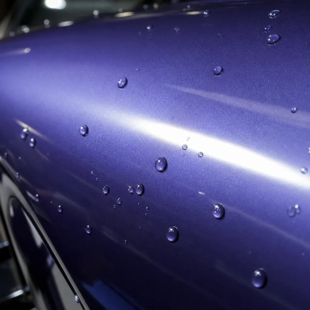 Close-up of Crystal Rosemary Purple gloss colored PPF surface texture | Veloro
