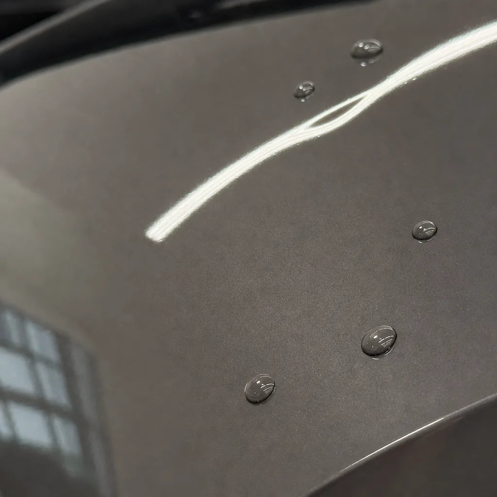 Close-up of Dark Chalkn Grey gloss colored PPF surface texture | Veloro