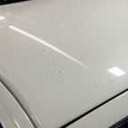 Close-up of Elegant White gloss colored PPF surface texture | Veloro