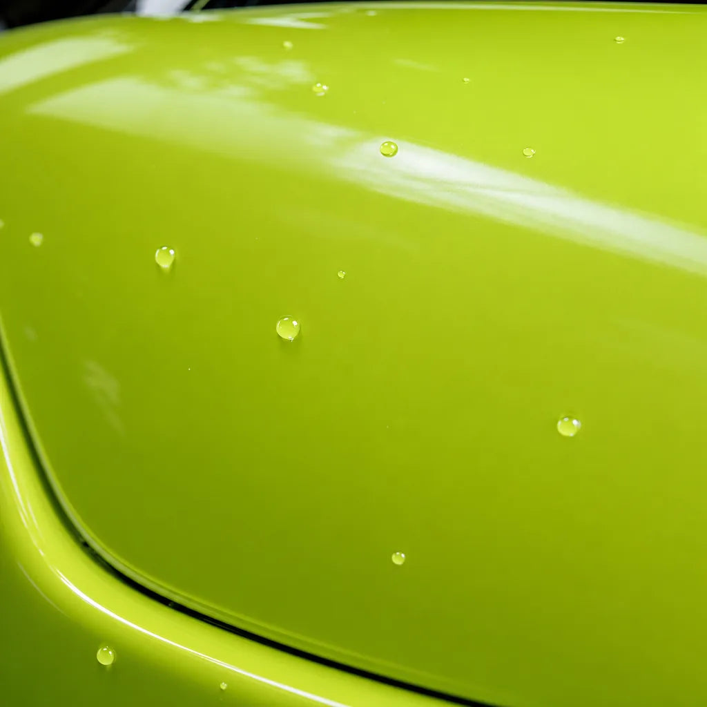 Close-up of Fluorescent Neon Yellow gloss colored PPF surface texture | Veloro