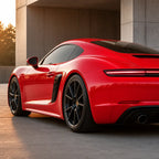 Luxury car wrapped in Healing Ferrari Red gloss colored PPF at golden hour | Veloro