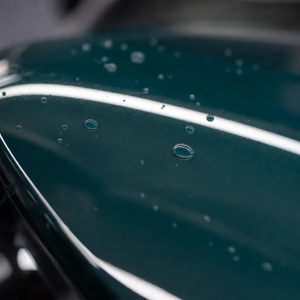 Close-up of Hell Green gloss colored PPF surface texture | Veloro