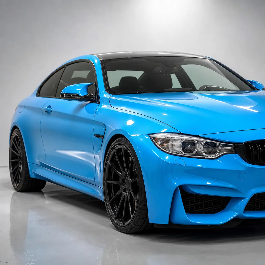 Ice Cream Blue gloss colored PPF wrapped on a BMW M4 | Veloro