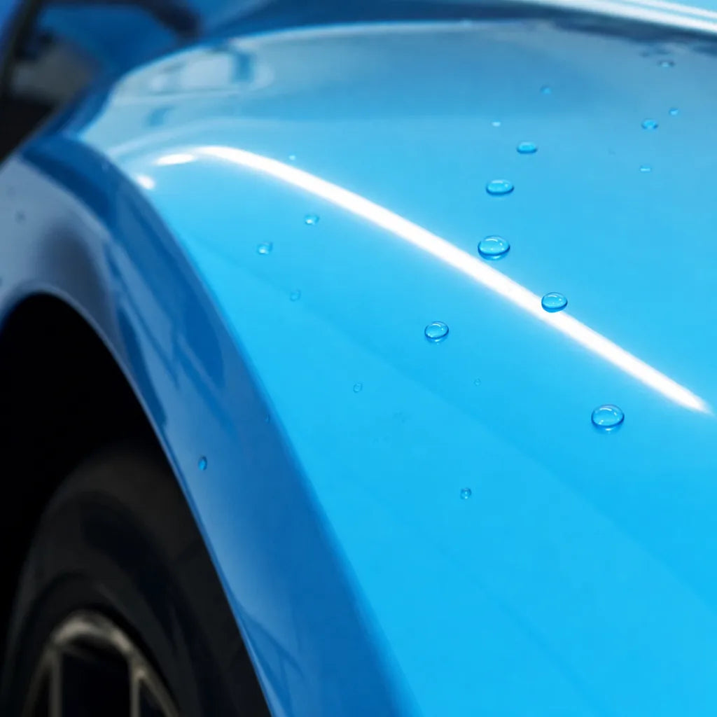 Close-up of Ice Cream Blue gloss colored PPF surface texture | Veloro