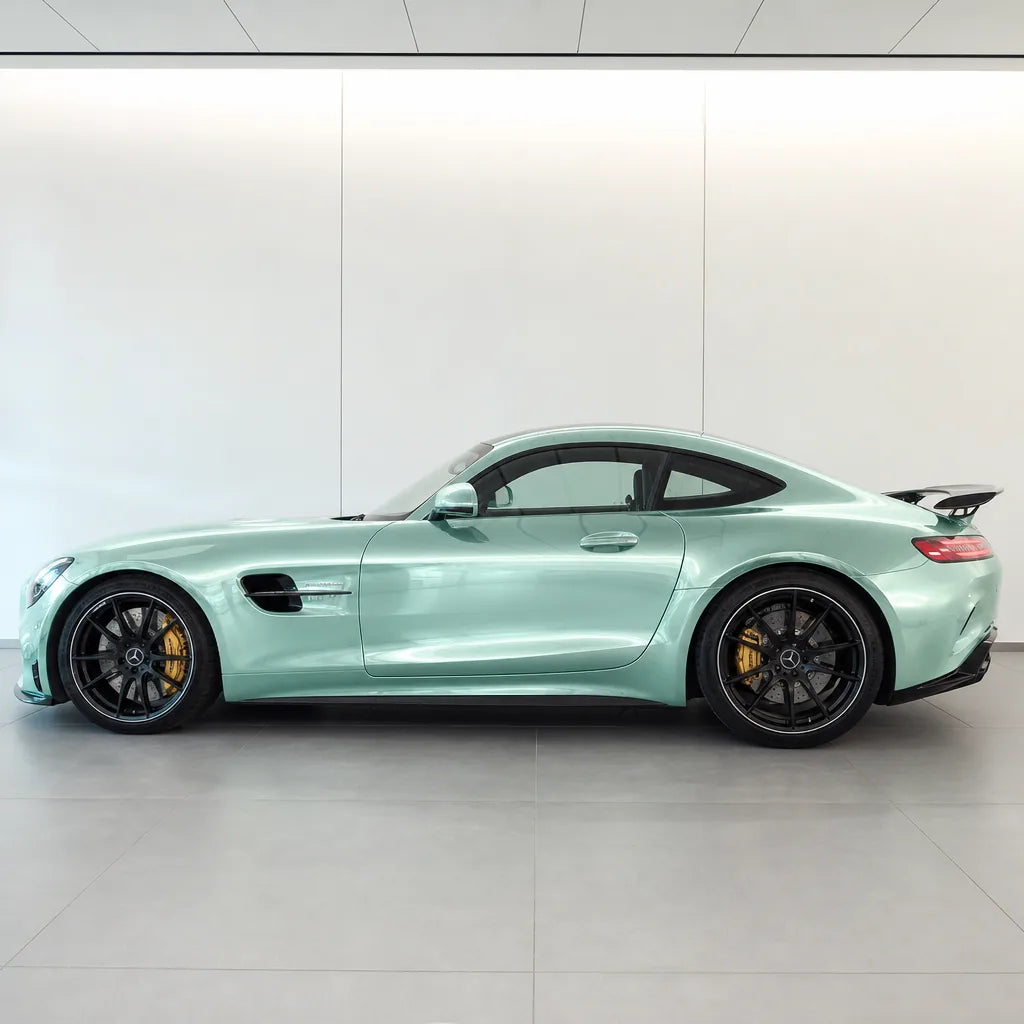 Liquid Metallic Grace Green gloss colored PPF wrapped on a Mercedes-AMG GT side profile | Veloro