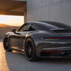Luxury car wrapped in Liquid Metallic Gunmetal Grey gloss colored PPF at golden hour | Veloro