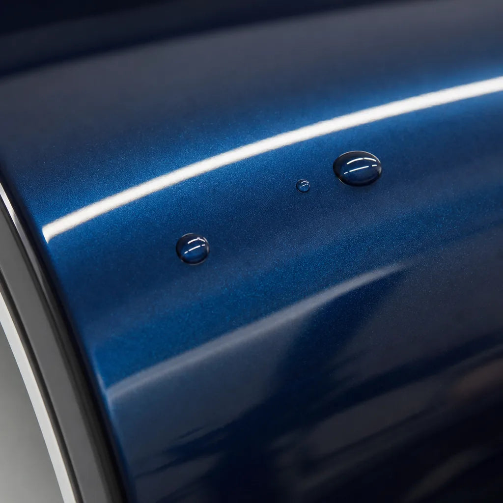 Close-up of Liquid Metallic Interstellar Blue gloss colored PPF surface texture | Veloro