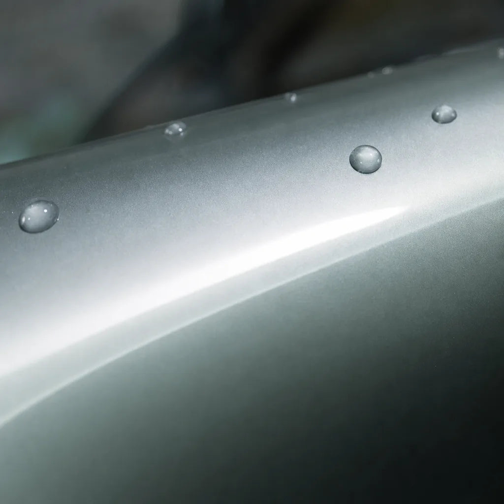 Close-up of Liquid Metallic Stellar Silver gloss colored PPF surface texture | Veloro