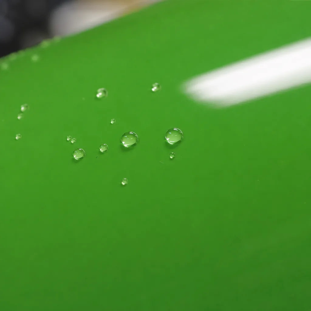 Close-up of Lizard Green gloss colored PPF surface texture | Veloro
