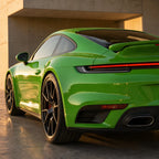Luxury car wrapped in Lizard Green gloss colored PPF at golden hour | Veloro