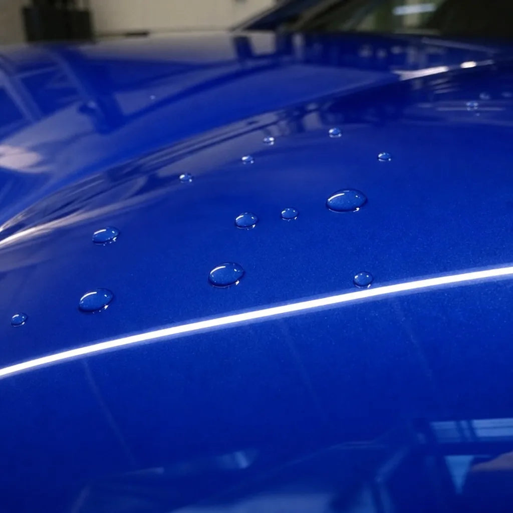 Close-up of Lugano Blue gloss colored PPF surface texture | Veloro