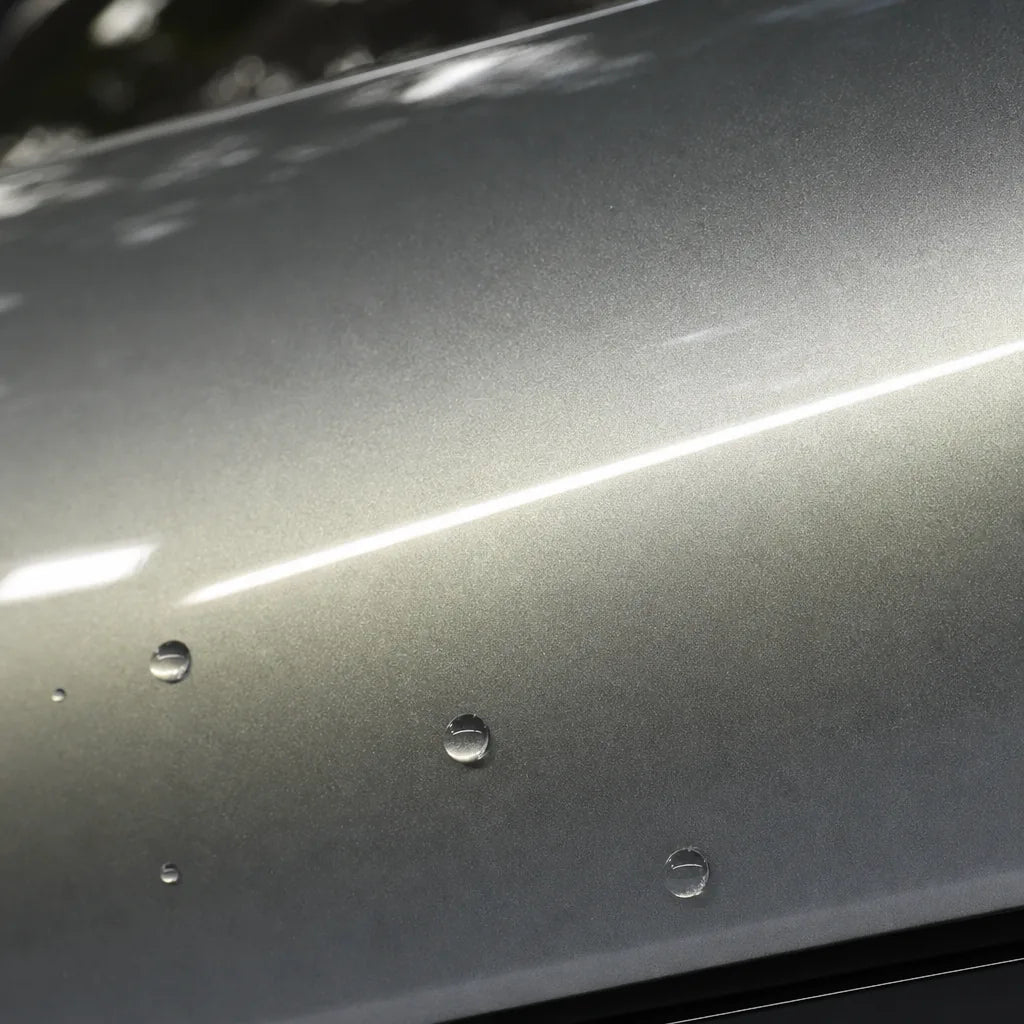 Close-up of Metallic Aquila gloss colored PPF surface texture | Veloro