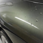 Close-up of Metallic Aventurine Green gloss colored PPF surface texture | Veloro