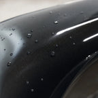 Close-up of Metallic BMW Diamond Graphite Grey gloss colored PPF surface texture | Veloro