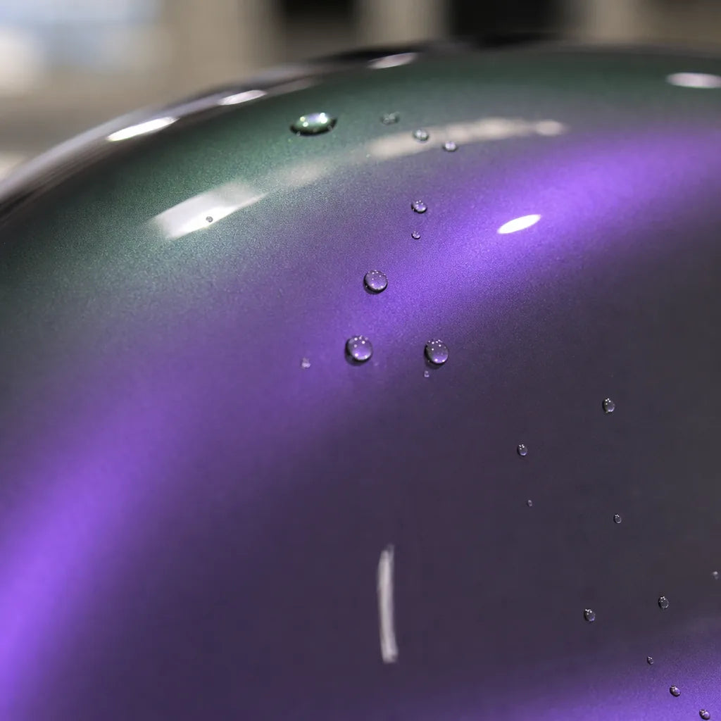 Close-up of Metallic Chameleon Candy Grey Purple Color PPF gloss colored PPF surface texture | Veloro