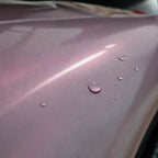 Close-up of Metallic Chameleon Pink gloss colored PPF surface texture | Veloro