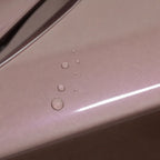Close-up of Metallic Chameleon Purple Pink gloss colored PPF surface texture | Veloro