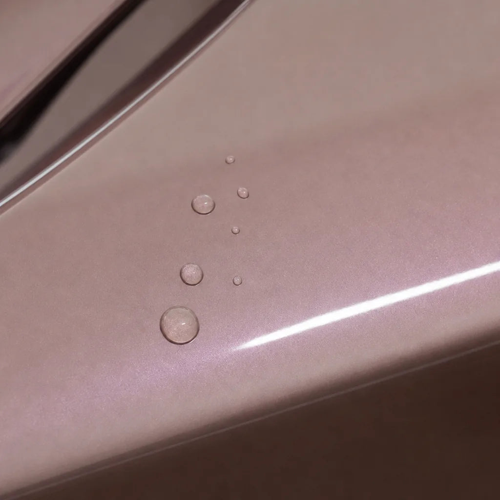 Close-up of Metallic Chameleon Purple Pink gloss colored PPF surface texture | Veloro