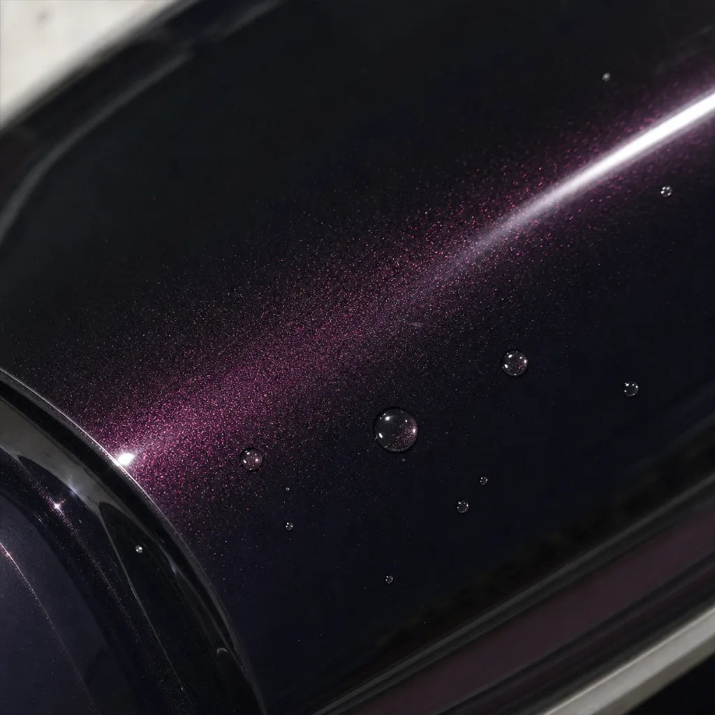 Close-up of Metallic Dark Agate gloss colored PPF surface texture | Veloro