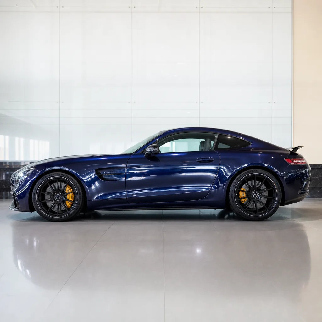 Metallic Dark Blue Audi Navarre Blue gloss colored PPF wrapped on a Mercedes-AMG GT side profile | Veloro