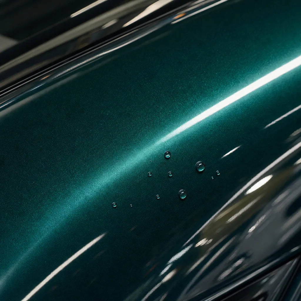Close-up of Metallic Deep Sea Green gloss colored PPF surface texture | Veloro