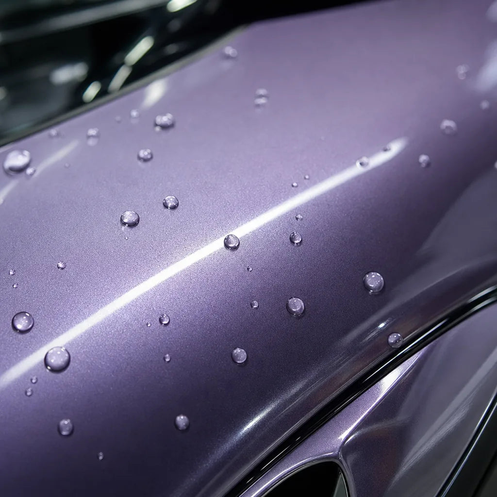 Close-up of Metallic Deep Violet Purple gloss colored PPF surface texture | Veloro