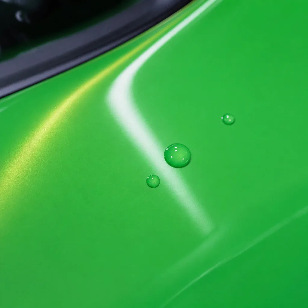 Close-up of Metallic Gold Green Color PPF gloss colored PPF surface texture | Veloro