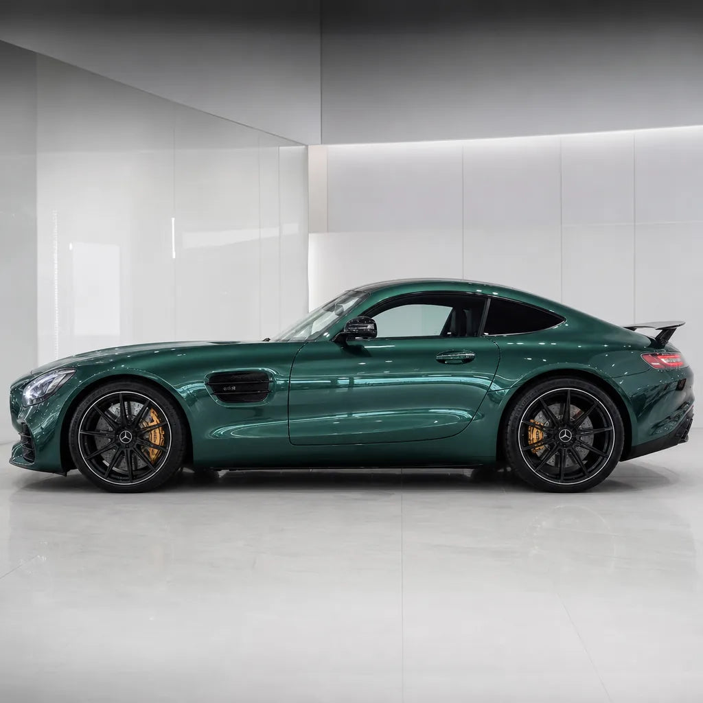 Metallic Gotland Green gloss colored PPF wrapped on a Mercedes-AMG GT side profile | Veloro