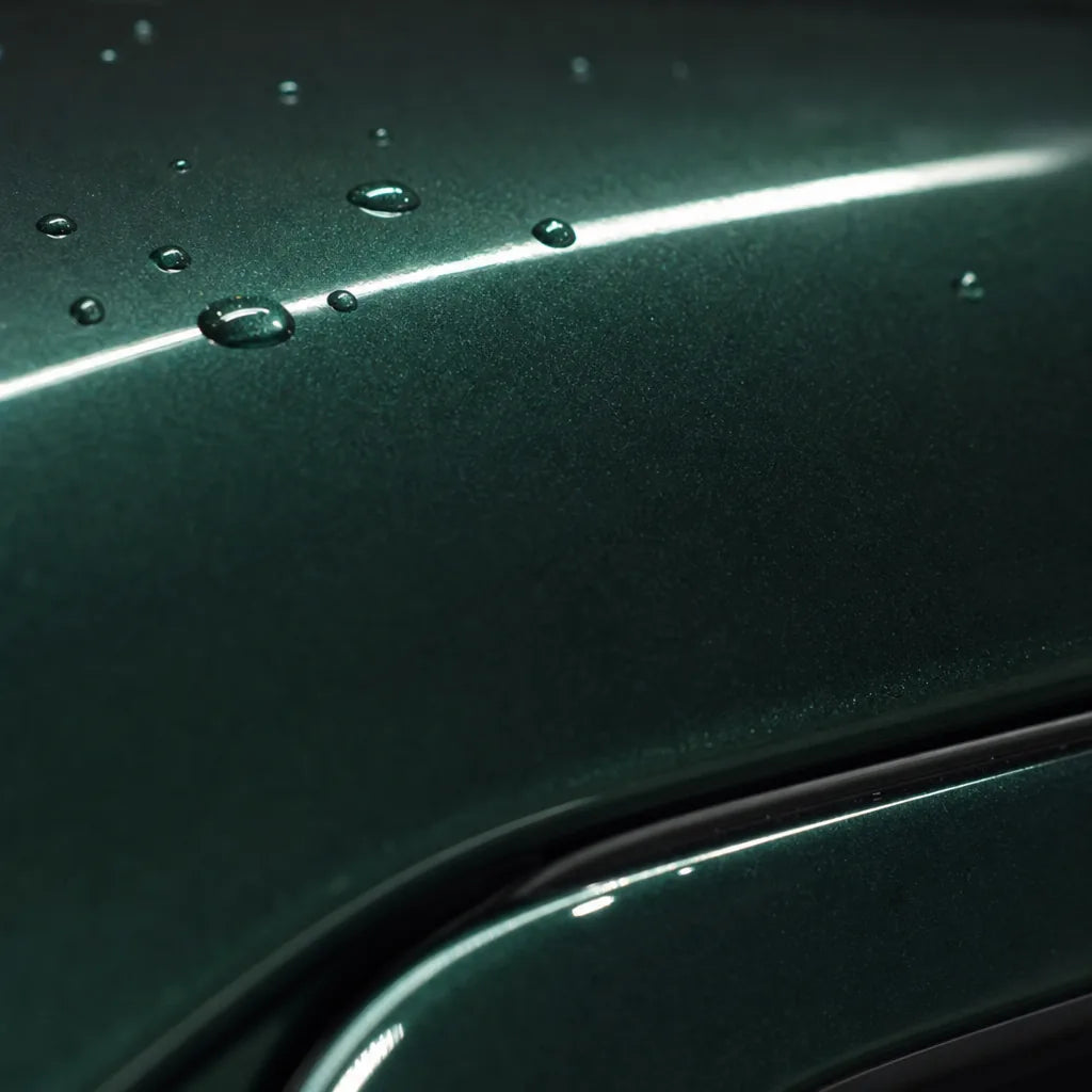 Close-up of Metallic Gotland Green gloss colored PPF surface texture | Veloro