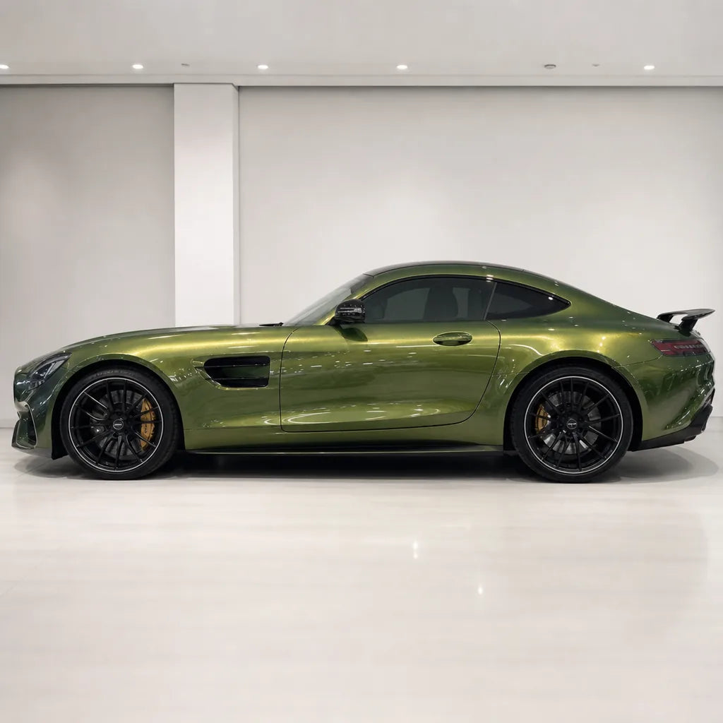 Metallic Iridescent Emerald Green gloss colored PPF wrapped on a Mercedes-AMG GT side profile | Veloro