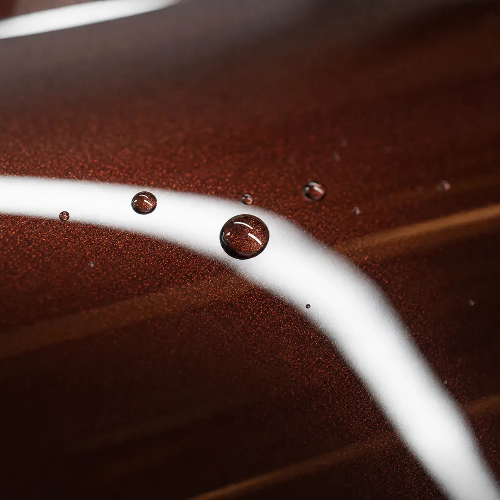 Close-up of Metallic Liquid Coffee Brown gloss colored PPF surface texture | Veloro
