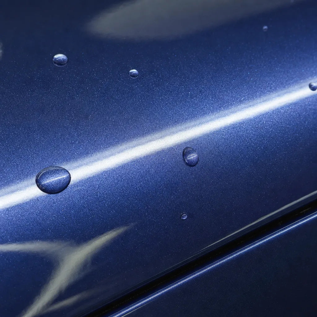 Close-up of Metallic Mist Blue gloss colored PPF surface texture | Veloro