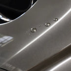 Close-up of Metallic Paint Champagne Gold gloss colored PPF surface texture | Veloro