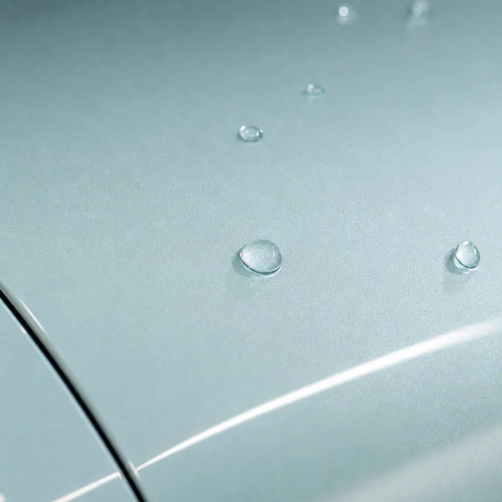 Close-up of Metallic Paint Glacier Blue gloss colored PPF surface texture | Veloro