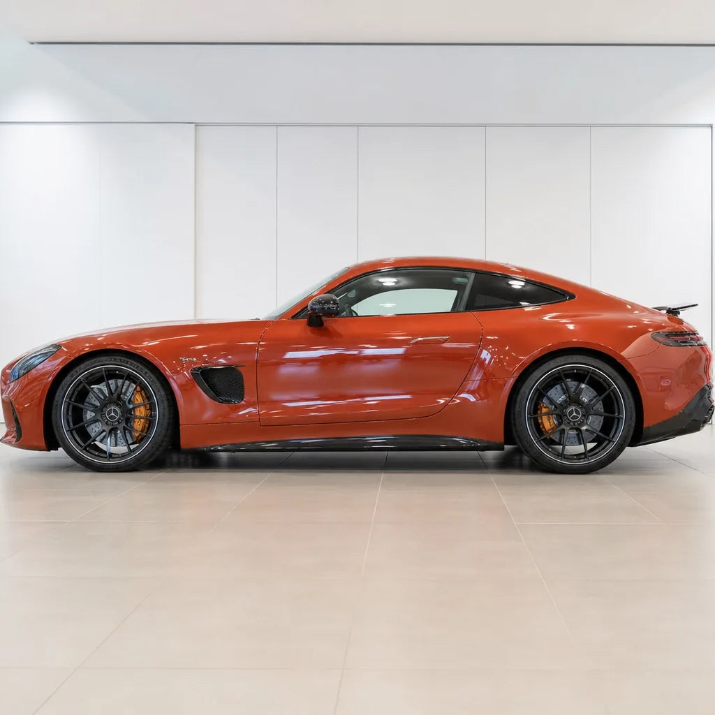 Metallic Papaiya Orange gloss colored PPF wrapped on a Mercedes-AMG GT side profile | Veloro