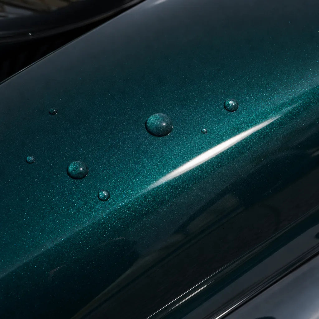 Close-up of Metallic Sand Green gloss colored PPF surface texture | Veloro